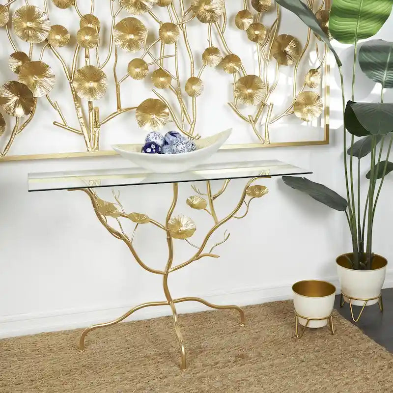 Console en métal avec plateau en verre et branches florales – Or – Roche River Decor