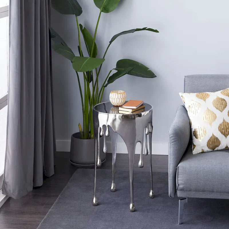 Table basse ou console en métal d'aluminium avec piètement au design fondu et plateau en verre fumé – Roche River Decor