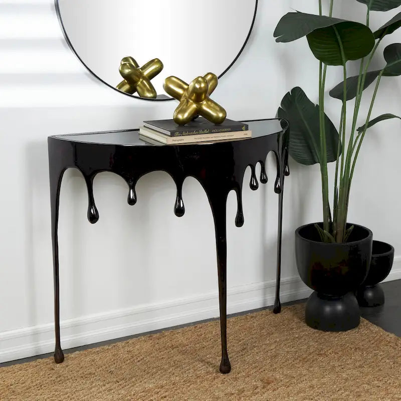 Table basse ou console en métal d'aluminium avec piètement au design fondu et plateau en verre fumé – Roche River Decor